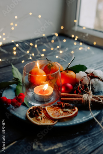 Christmas candle on a plate photo
