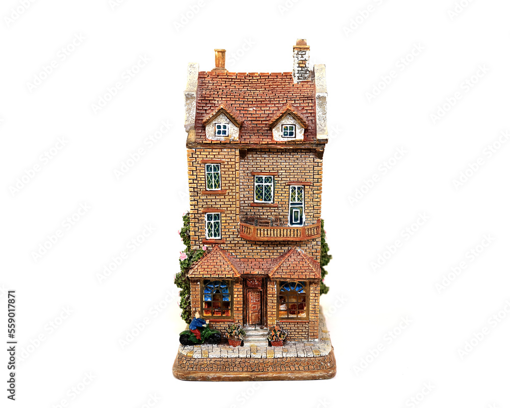 Obraz premium Miniature fairytale home toy on white background.
