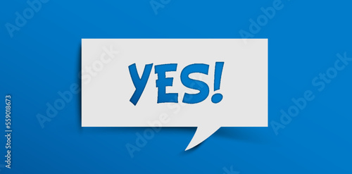 Yes sign showing positive answer, joy, agreement, celebration, affirmative decision or determination. Word yes on cutout paper speech buble on blue background.