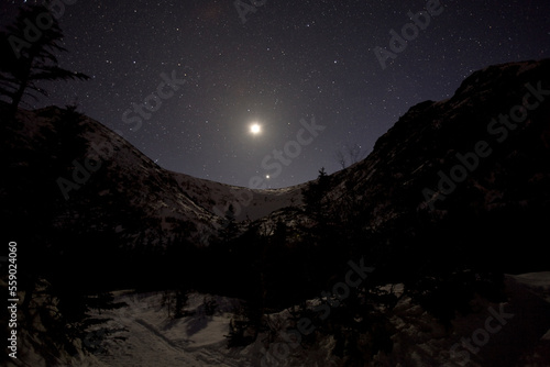 Mt. Washington in the White Mountains of New Hampshire by moonlight. photo