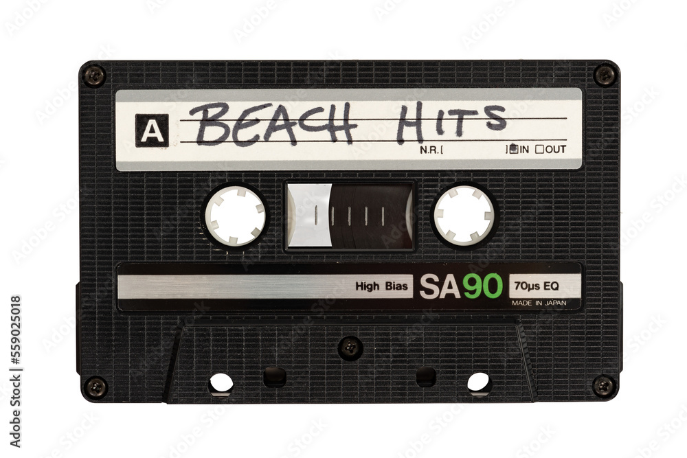 Isolated close up of a cassette tape labeled Beach Hits Isolated close up of a cassette tape labeled Beach Hits