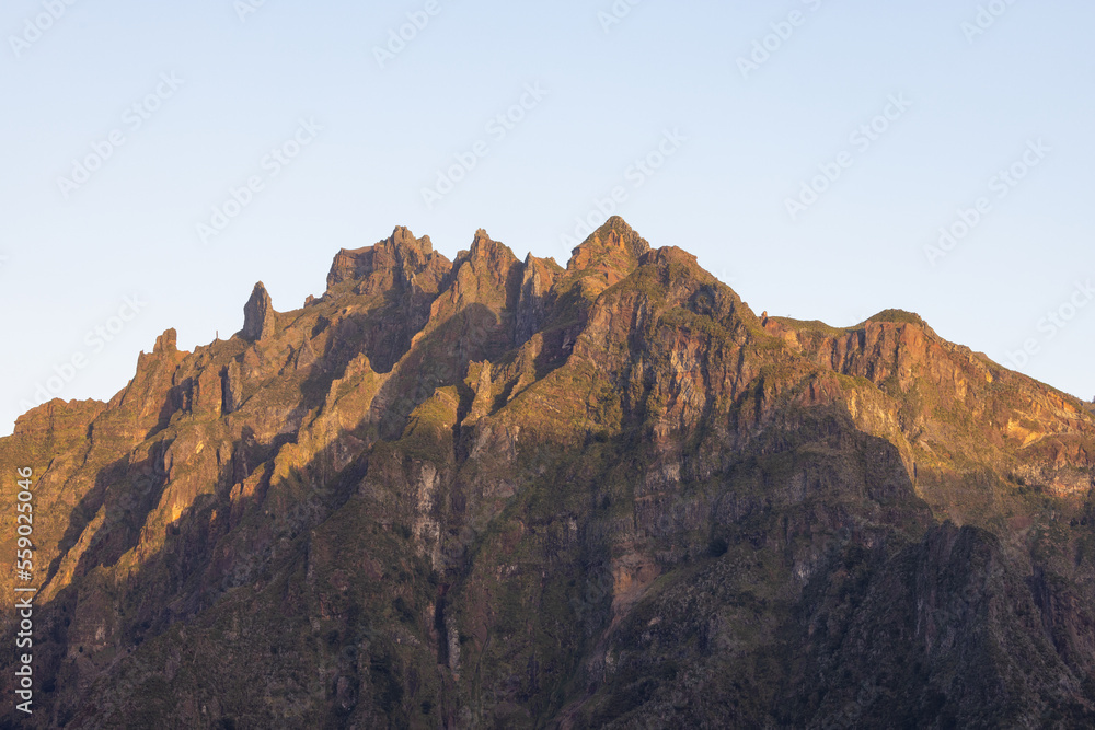 The mountain peaks in Madeira are kissed by the morning sun.