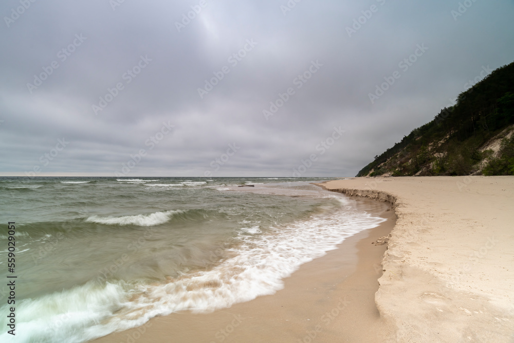 Natural landscape from the sea on a cloudy windy day.