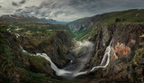 Landscape panorama of Voringsfossen waterfall in a valley at Hardangervidda National Park from above in Norway
