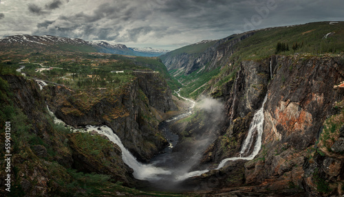 Landscape panorama of Voringsfossen waterfall in a valley at Hardangervidda National Park from above in Norway