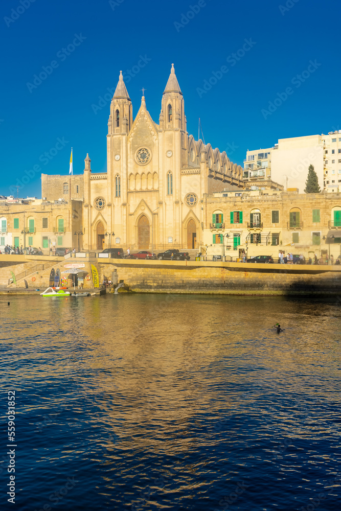 Sliema, Malta, 22 May 2022:  The Cathedral right on the harbor of Sliema