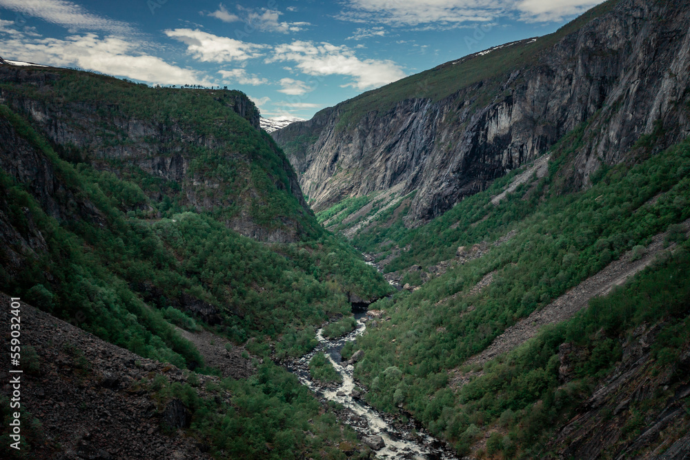 River in the valley of Voringsfossen waterfall at Hardangervidda National Park in Norway from above