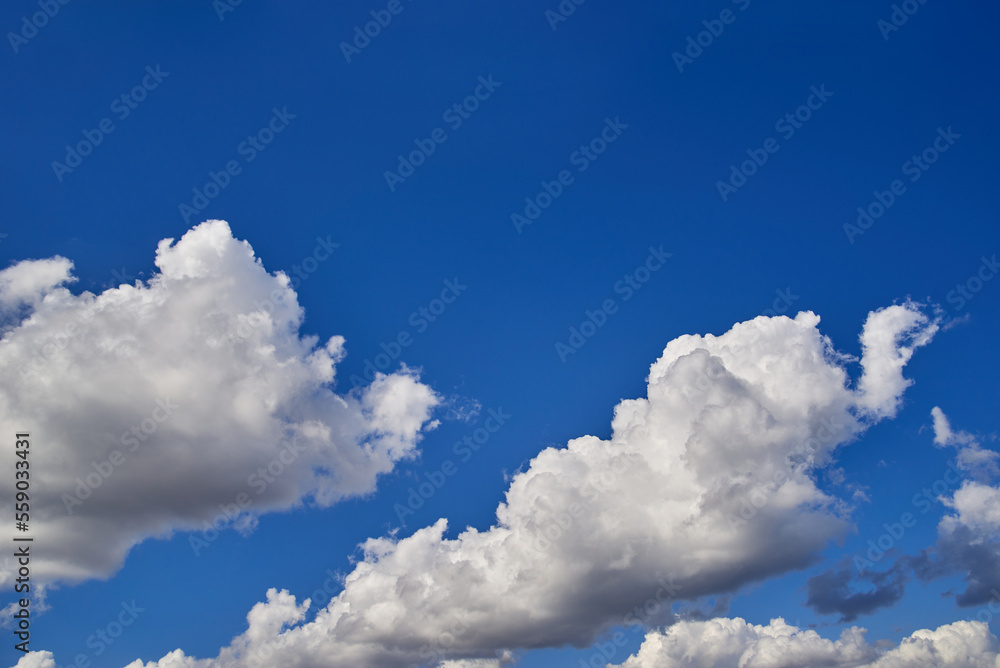 Fototapeta premium Sunny sky. Cloudscape Background. Close up of clouds