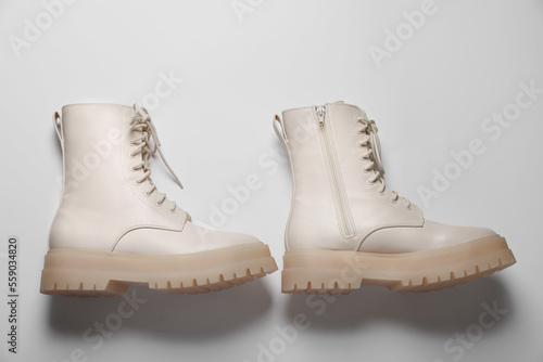 Pair of stylish leather shoes on white background, flat lay