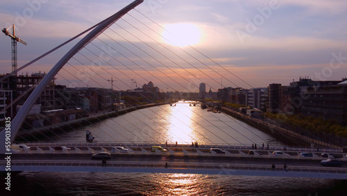 Photography Samuel Beckett Bridge over River Liffey in Dublin - aerial view by drone