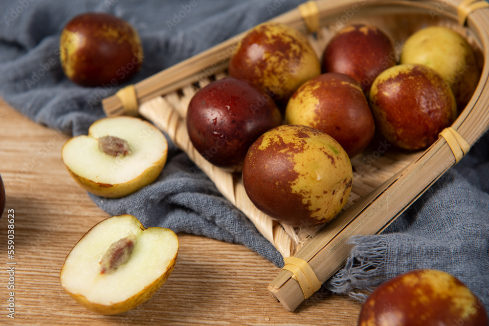 Chinese jujube or winter jujube on wooden table Chinese jujube or winter jujube on wooden table