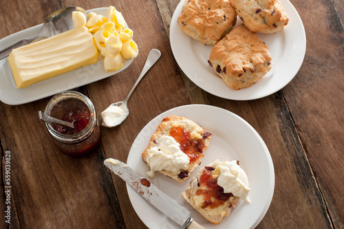 Tasty teatime with fruit scones, butter and cream