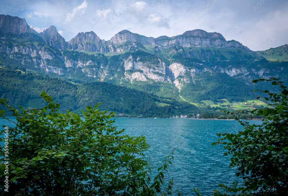 Beautiful blue water of Lake Walensee in Switzerland - travel photography Beautiful blue water of Lake Walensee in Switzerland - travel photography
