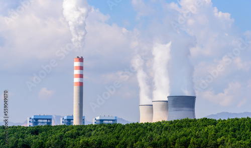 Coal fired electric power plant with agriculture field landscape. Hongsa city, Laos.