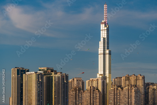Ho Chi Minh City, Viet Nam 24 March 2022: Beautiful Sunset at Landmarks 81 Ho Chi Minh City, the tallest building in Vietnam, with Vietnam flag on the top building.