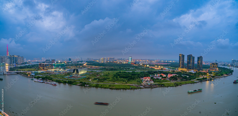 HO CHI MINH, VIETNAM - April 29, 2022: Ho Chi Minh City at night, view to District 2, Thu Duc City, light trail, landmark 81