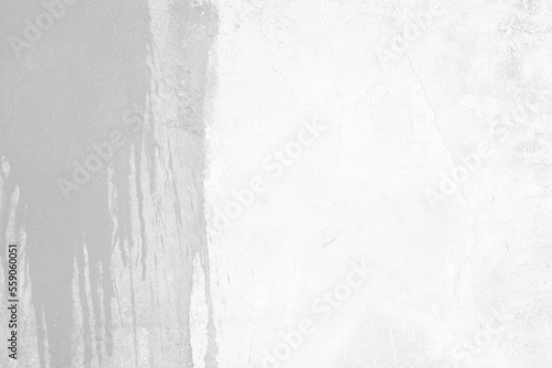 White Stained on Grunge Concrete Wall Background. © mesamong