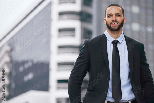 Portrait, business and man in city, outdoor and corporate manager with smile, suit and career. Latino male, manager or ceo in street, employee and leader with company success, leadership or executive