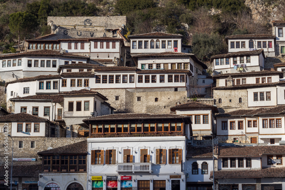 Traditional houses In Berat, Albania, Europe. Cityscape with those famous aligned white facades. Blue sky.