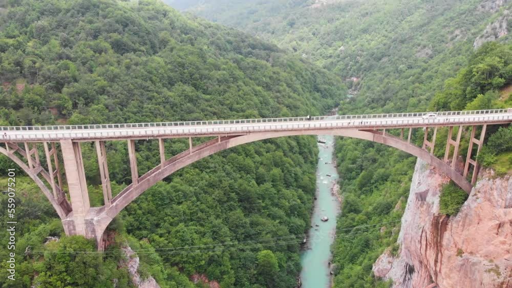 Aerial of Djurdjevica Bridge over Tara river canyon in Montenegro. Grerat tourist attraction and unique architectural structure Aerial of Djurdjevica Bridge over Tara river canyon in Montenegro. Grerat tourist attraction and unique architectural structure