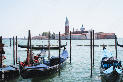 Venice, Italy: San Giorgio Maggiore church and gondolas at sunny day in Venice, Italy. © Hanna