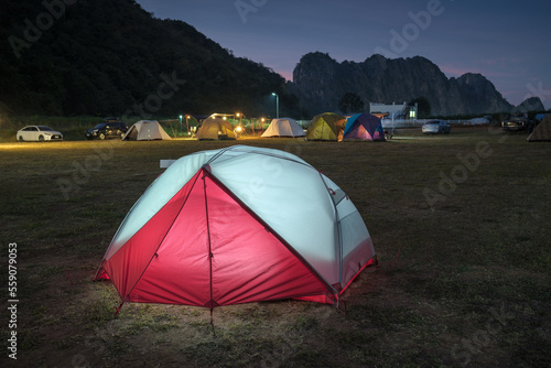 Tourist tent at night. evening sky