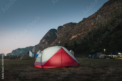 Tourist tent at night. evening sky