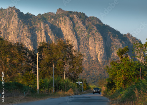 Sunlight glowing along the ridges of the mountain 