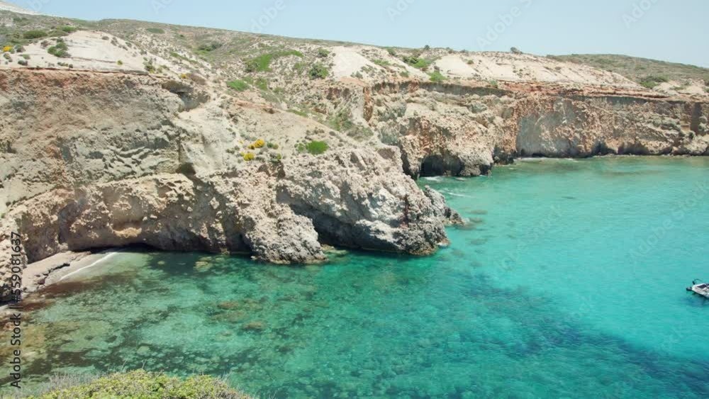 Scenic view of the rural rocky coastline on Milos Island, Greece Scenic view of the rural rocky coastline on Milos Island, Greece
