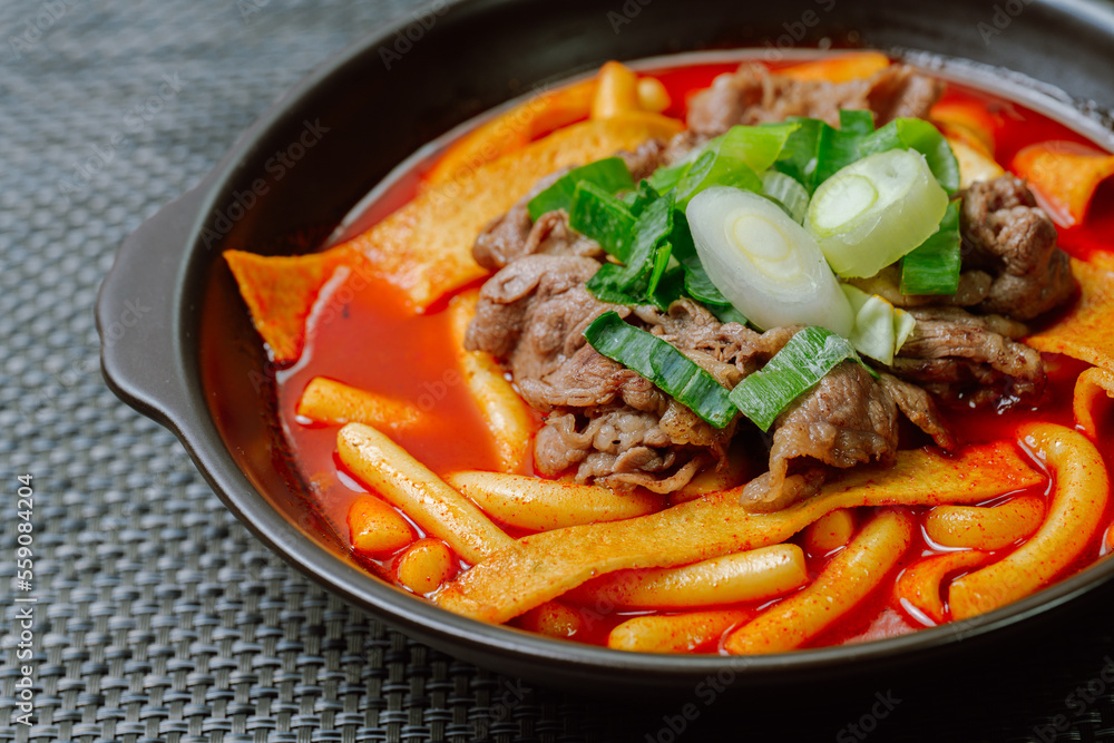 Tteokbokki, Stir-fried Rice Cake : Sliced rice cake bar (garaetteok) or thin rice cake sticks (Tteokbokkitteok) stir-fried in a spicy gochujang sauce with vegetables and fish cakes. Tteokbokki, Stir-fried Rice Cake : Sliced rice cake bar (garaetteok) or thin rice cake sticks (Tteokbokkitteok) stir-fried in a spicy gochujang sauce with vegetables and fish cakes.