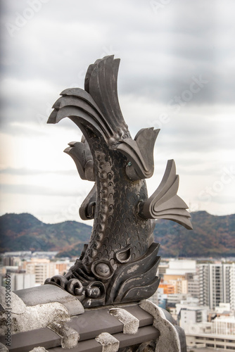 Himeji Japan 30th Nov 2022:  The mythical tiger-headed fish called shachi on the rooftop of Himeji Castle. This motif was used atop the castle towers as a talisman for fire prevention. © Danny Ye