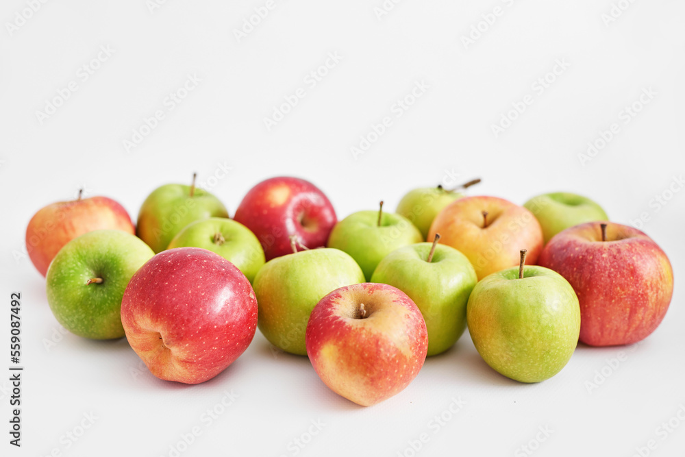 Apples on white background. Fruits and vitamins. Healthy eating. Veganism, diet Apples on white background. Fruits and vitamins. Healthy eating. Veganism, diet