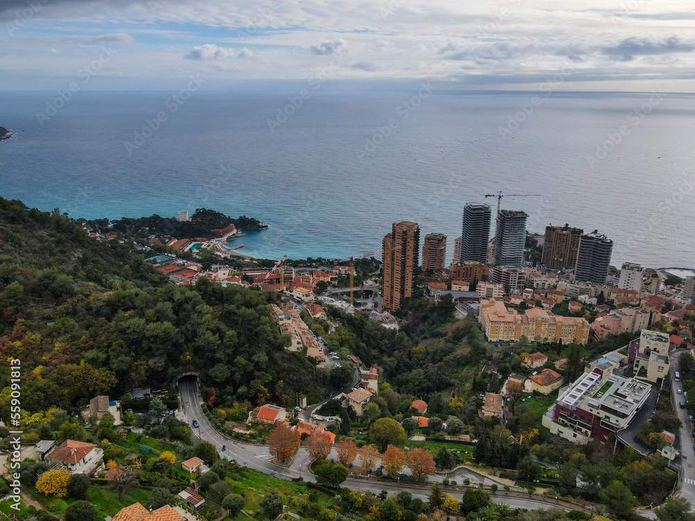 Fototapeta premium Aerial panoramic view of Monte Carlo. Monaco is a country on the French Riviera in Europe. Drone view of the famous city on the Mediterranean Sea, Monte Carlo casino in the city center, Marina Port.