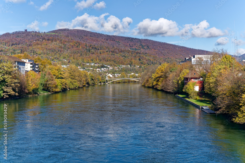 Beautiful autumn landscape with bridge over Aare River in the background at Swiss City of Olten on a sunny autumn day. Photo taken November 10th, 2022, Olten, Switzerland. Beautiful autumn landscape with bridge over Aare River in the background at Swiss City of Olten on a sunny autumn day. Photo taken November 10th, 2022, Olten, Switzerland.