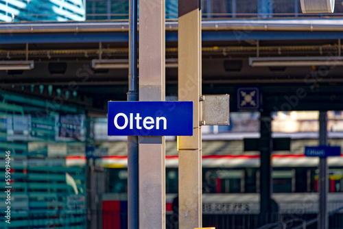 Blue and white sign at Swiss railway station Olten on a sunny autumn day. Photo taken November 10th, 2022, Olten, Switzerland.