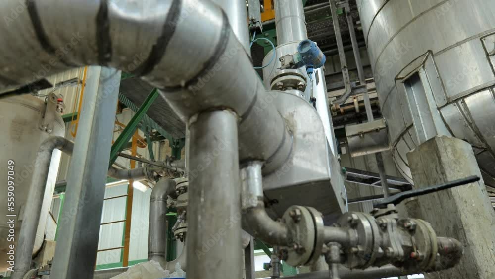 Engineering complex of Production area structure, piping , valve, machinery, engineering equipment in petroleum refinery plant , Smooth panning video. Oil and Gas refinery industrial concept Engineering complex of Production area structure, piping , valve, machinery, engineering equipment in petroleum refinery plant , Smooth panning video. Oil and Gas refinery industrial concept