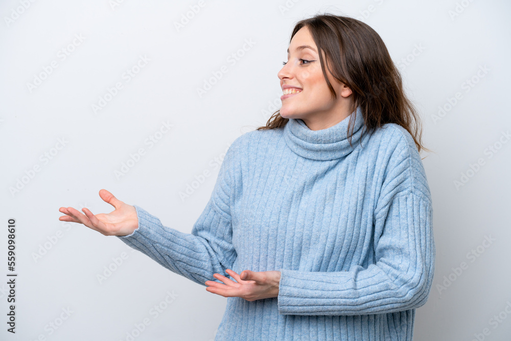 Young caucasian woman isolated on white background with surprise expression while looking side Young caucasian woman isolated on white background with surprise expression while looking side