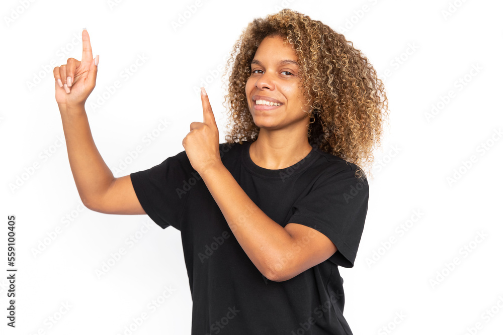 Excited African American woman pointing up. Portrait of happy young ...