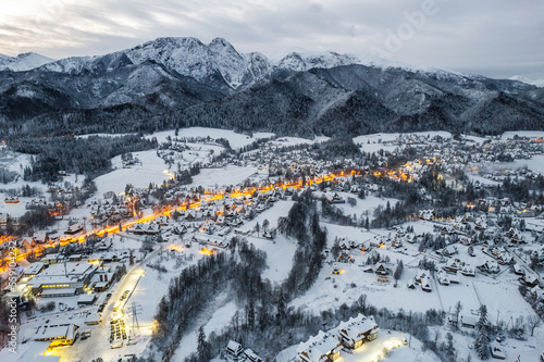 Winter landscape of Zakopane town and Tatra Mountains, drone view