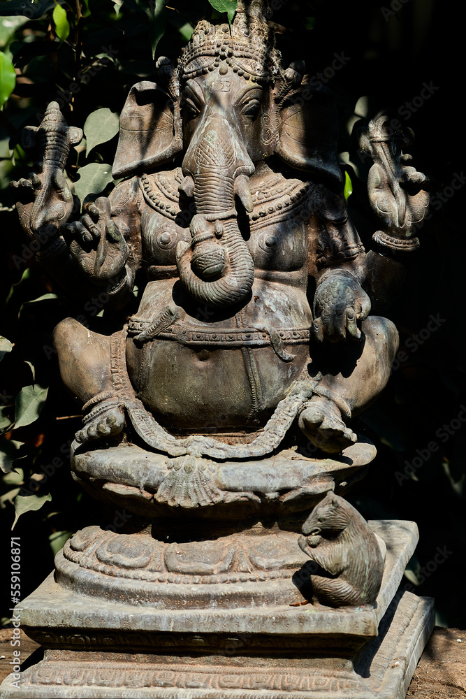 Statue of the indian god Ganesha in yoga like pose