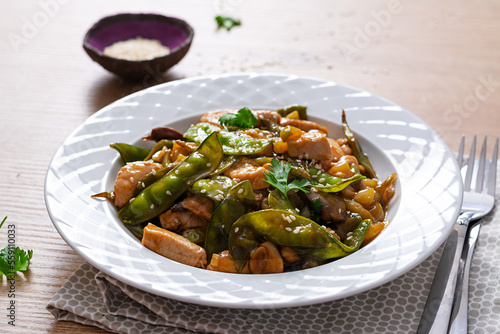 Stir fry chicken, green peas and green beans.. Asian style