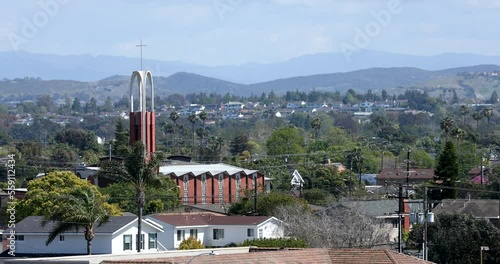 Palm framed view of downtown Costa Mesa, California, USA.