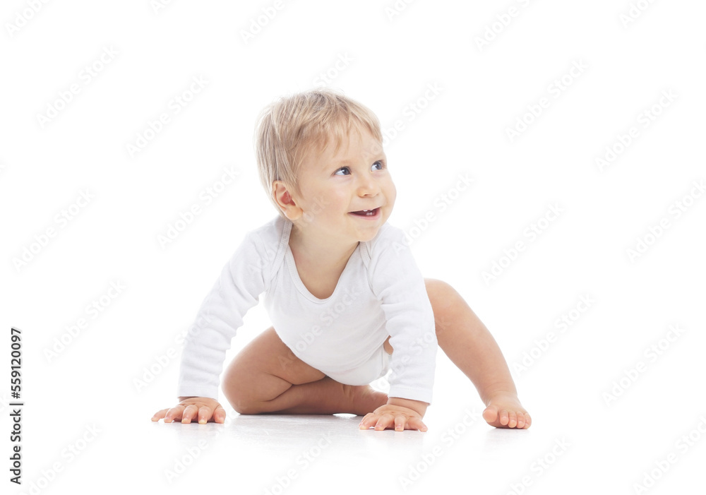 Little, happy and smiling cute baby in the studio. Portrait of a one year old baby. The concept of happiness. Little, happy and smiling cute baby in the studio. Portrait of a one year old baby. The concept of happiness.