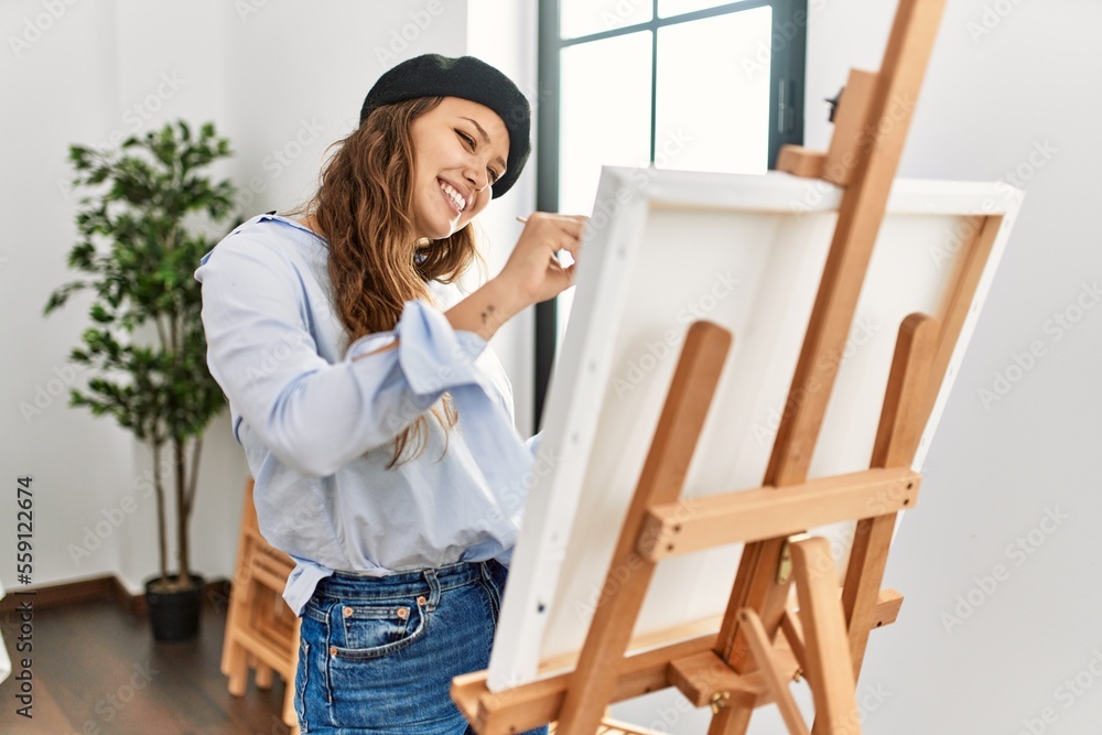 Young beautiful hispanic woman artist smiling confident drawing at art studio Young beautiful hispanic woman artist smiling confident drawing at art studio