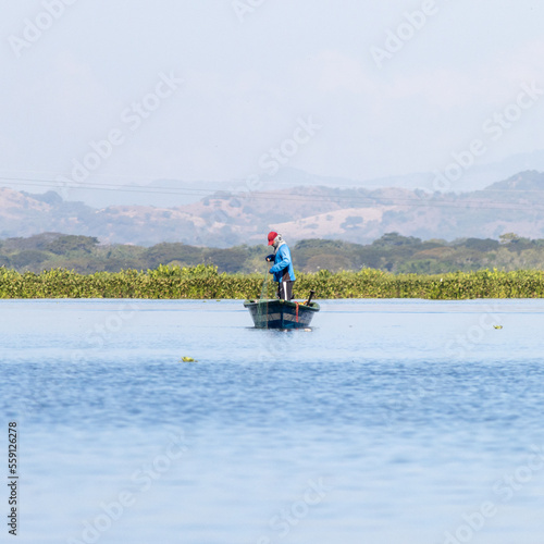 Fisherman in the Olomega lagoon in San Miguel, El Salvador