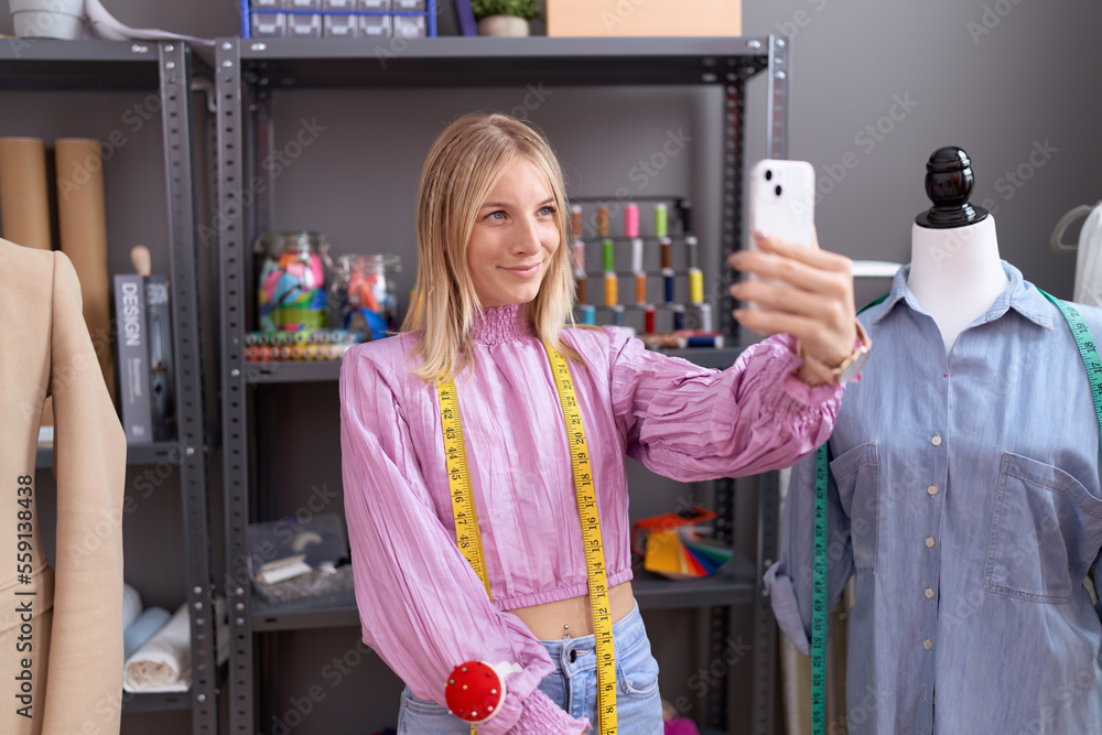 Young blonde woman tailor smiling confident make selfie by smartphone at tailor shop Young blonde woman tailor smiling confident make selfie by smartphone at tailor shop