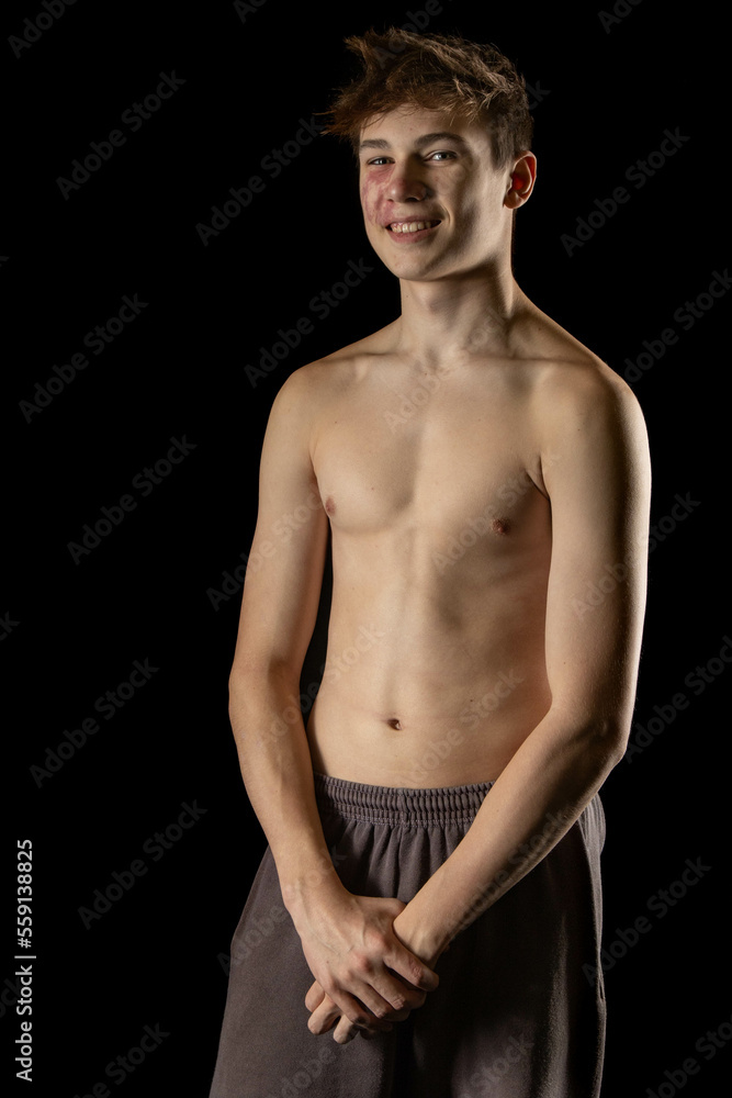 Fototapeta premium A shirtless 17 year old muscular boy