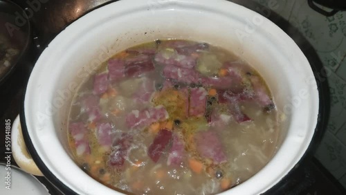Making soup with various ingredients at home