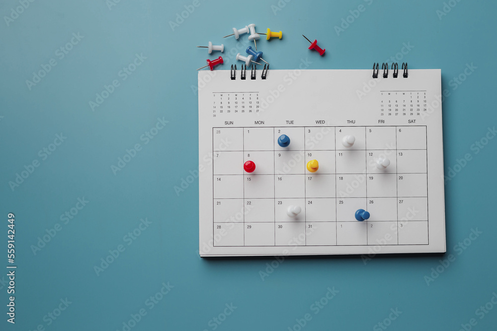 Embroidered red pins on a calendar event Planner calendar,clock to set timetable organize schedule,planning for business meeting or travel planning concept.	
 - obrazy, fototapety, plakaty 