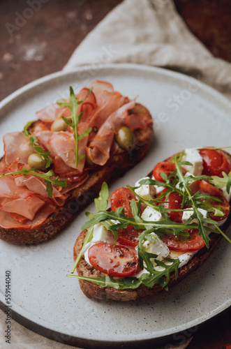 Homemade rustic roasted sandwiches, breakfast photo